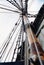 Viewup the mast of a replica 18th century ship off of Diamond Head, Hawaii