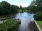 Vigelandsparken, Oslo, Norway in 19, July 2007: tourists feed various birds ducks, swans and gulls that swim in a clean beautiful