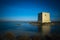 Vigilance Tower in natural park of Santa Pola surrounded by water