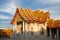 Vihan Buddhist temple of Wat Benchamabophit Marble Temple on a sunny evening. View from the courtyard. Bangkok, Thailand