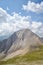 Vihren peak view with clouds in Pirin Mountains in Bulgaria