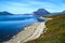 Viking warriors and farmers - view of the shore at Hvalsey Viking church meadows, homesteads and mountain view in Greenland