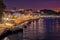 Vila Nova de Gaia waterfront promenade at sunset, Portugal.