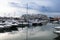 Vilamoura, Portugal - view of the marina pier and the boats near the walkway