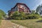 Villa Arnaga in Cambo-les-Bains, as seen from the park, typical house of neo Basque style in French Atlantic Pyrenees