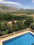 Villa Pool and mountain landscape near Orba, Spain