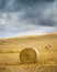 Villa on top of hill overlooks recently harvested hay bales