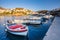 Village Bali, Island Crete, Greece, - June 24, 2016: Beautiful morning scenery with mountains, bay of Mediterranean sea and a pier