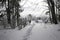 Village cemetery in the evening in winter, harsh climate