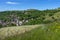 The village of Courzieu in the landscape of the Lyonnais mountains in spring in France