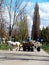 Village Debeljaca, Vojvodina, Serbia. Gipsy wagon in the center of the village. White horse. Wagon full of various material.