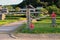 Village entrance sign and ricefield in Asuka