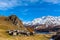 Village of Grevasalvas and the Alps in golden autumn