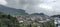 village in the highlands covered in cloud