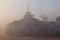 Village monastery in a morning mist in the area between Kalaw and Inle, Myanm