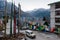 Village in the morning with stupa, Tibetan prayer flags and tourist car in winter at Lachung in winter. North Sikkim, India.