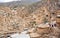 Village in mountains with small clay houses of iranian province