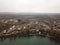 Village near the lake seen from the drone in early spring. aerial capture on a foggy day