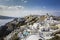 Village of Oia with white cave homes on Santorini Island