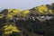 The village on the opposite side of the river, winding mountain path, in the terraced fields