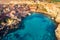 Village Popeye bay panorama Malta sunset. Aerial top view