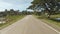 Village Road. Motion on motorbike. Philippines. Bohol island. Driving forward.