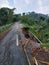 Village roads damaged by landslides caused by heavy rains.