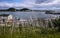 A village on the rocky shore of the fjord in Norway with