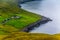 Village in the rugged landscape in Faroe Islands