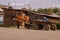 A village in Russia in the summer, children on a cart, horses. The village of Ust-Tsilma, the original authentic life of the villa