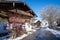 Village street of the mountaineering village of Sachrang in Chiemgau, Bavaria, Germany in winter