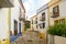 Village street with residential buildings in the town of Bordeira near Carrapateira, in the municipality of Aljezur in the Distric