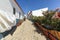 Village street with residential buildings in the town Carrapateira, in the municipality of Aljezur in the District of Faro,