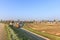 Village view Waardenburg with original village houses in polder landscape