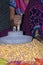 A village woman`s hand, grinds gram in an old hand operated flour mill