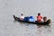 Villagers travel by ferry boat