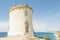 Villajoyosa, Spain. Old tower Torre de Malladeta and Mediterranean Sea. La Vila Joiosa is beautiful coastal town in