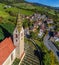 Villandro, Italy - Aerial view of the tower of the Church of St.Michael at the small village of Villandro Villanders at summer