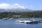Villarrica, one of the most active volcanoes in Chile, seen from Pucon.with boat marina with luxurious architecture.