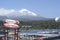 Villarrica, one of the most active volcanoes in Chile, seen from Pucon.with boat marina with luxurious architecture.may 2016