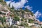 Villas in Positano close up, town at Tyrrhenian sea, Amalfi coast, Italy, hotel and hostel concept, sea with ships and boats,