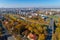 Vilnius Cityscape with Autumn Trees and Traffic. Lithuania