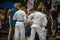 Vilnius, Lithuania - 30082020: Young Japanese combat participants preparing for fight on street during Japanese weekend