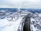 Vilnius, Lithuania: aerial top view of Neris river and Lazdynai Bridge in winter