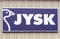 Vilnius, Lithuania - April 19, 2019: Jysk logo company. signboard of furniture company on the facade of large shopping center