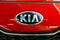 Vilnius, Lithuania. Close Oval Logo Of Kia Motors At Red Hood Of