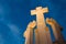 Vilnius, Lithuania. Famous White Monument Three Crosses On The Bleak Hill In Lighting In Evening Or Night Illumination.