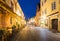 Vilnius Lithuania. Illuminated Pilies Street Of Old Town In Nigh