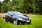 VILNIUS, LITHUANIA - JULY 10, 2012: Luxury Lexus Car. Forest in Background.