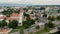 Vilnius, Lithuania - July, 2019: Aerial view of the church of Archangel Raphael and cityscape of Vilnius at summer day.